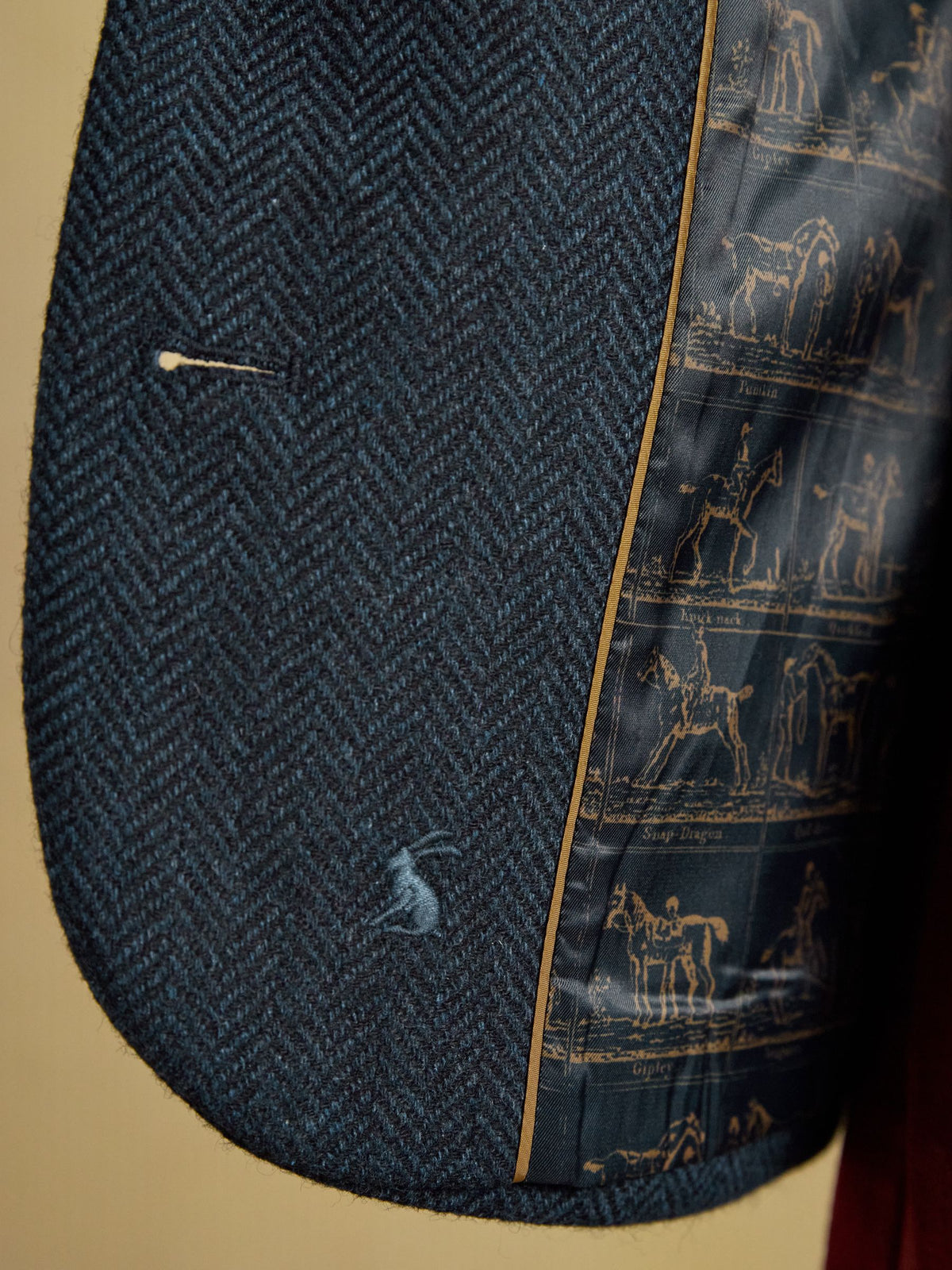 Joules women's navy herringbone tweed gilet with equestrian print lining