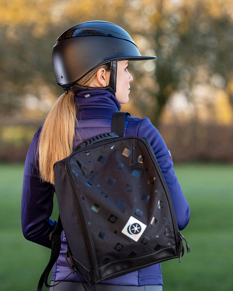 Charles Owen Hat Bag: Black riding helmet backpack for equestrian gear protection.