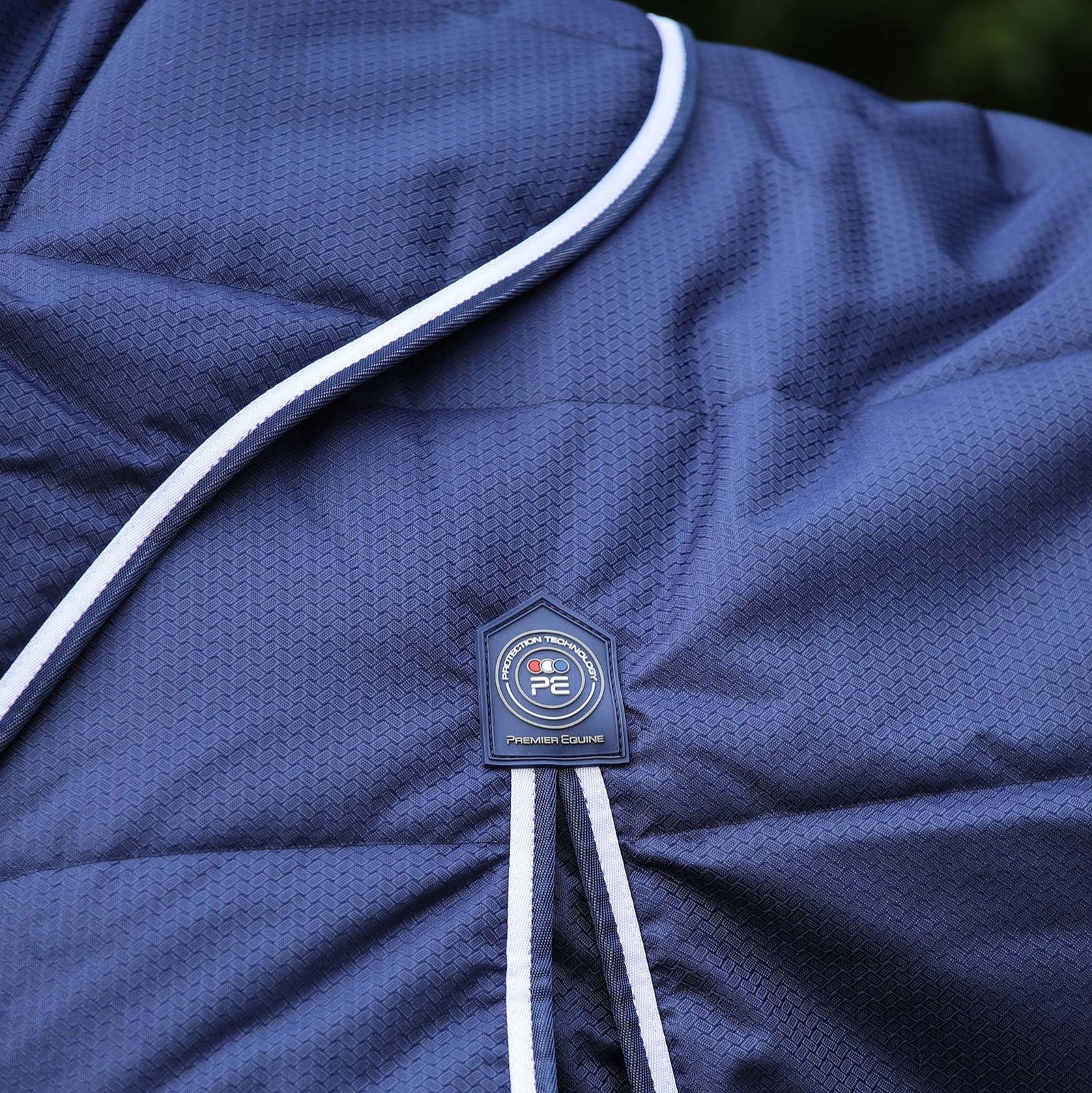 Premier Equine Navy Horse Stable Rug 200g with Neck Cover: Protective and Comfortable Equine Bedding.