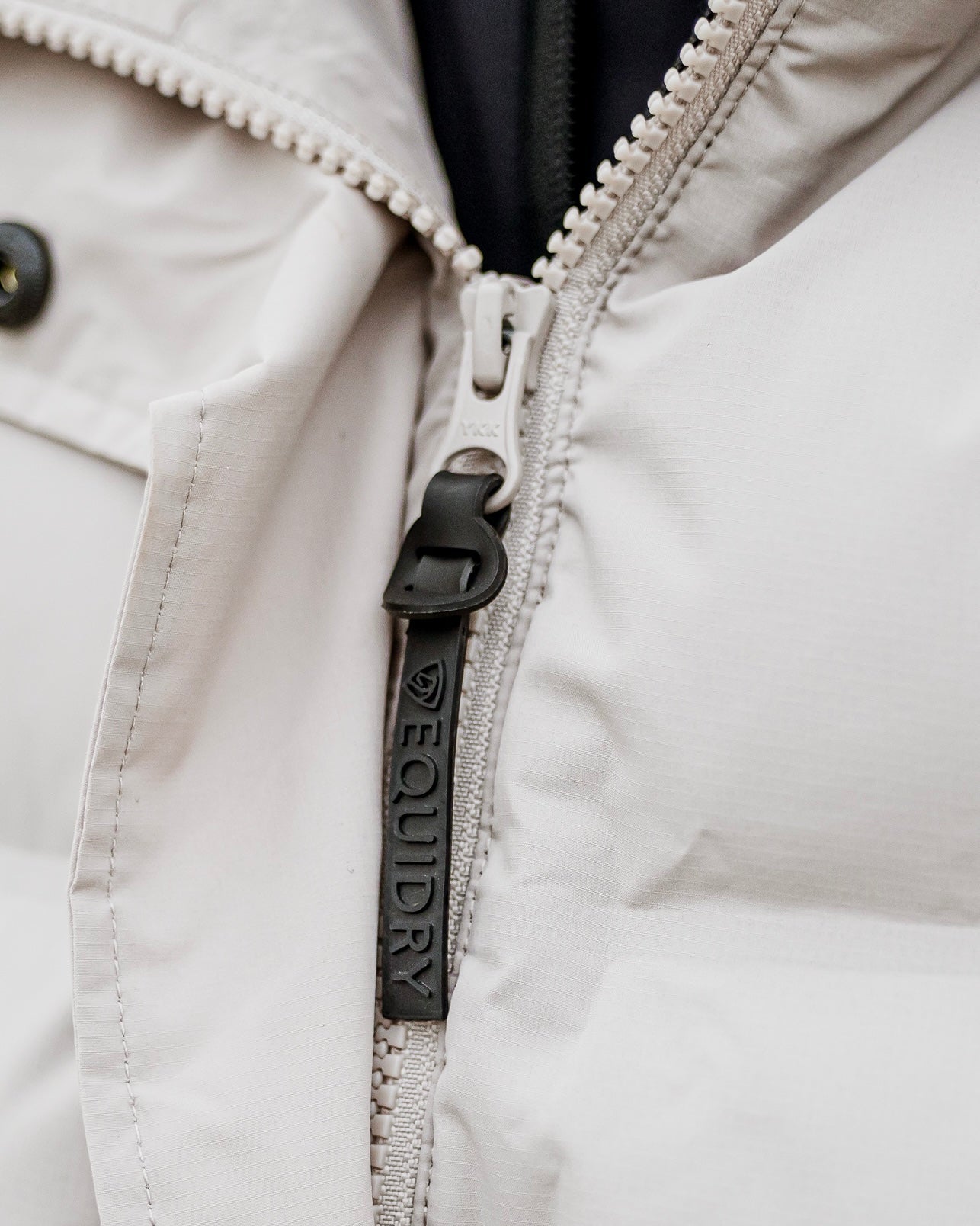 Equidry Thora Waterproof Riding Puffer Jacket for Women - Sand Color, Close-up of Zipper