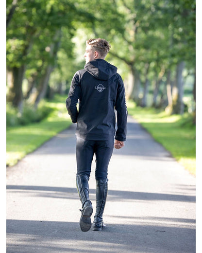 LeMieux Mens Elite Soft Shell Jacket Black - Equiflair Equestrian Apparel, Rider Walking on Path
