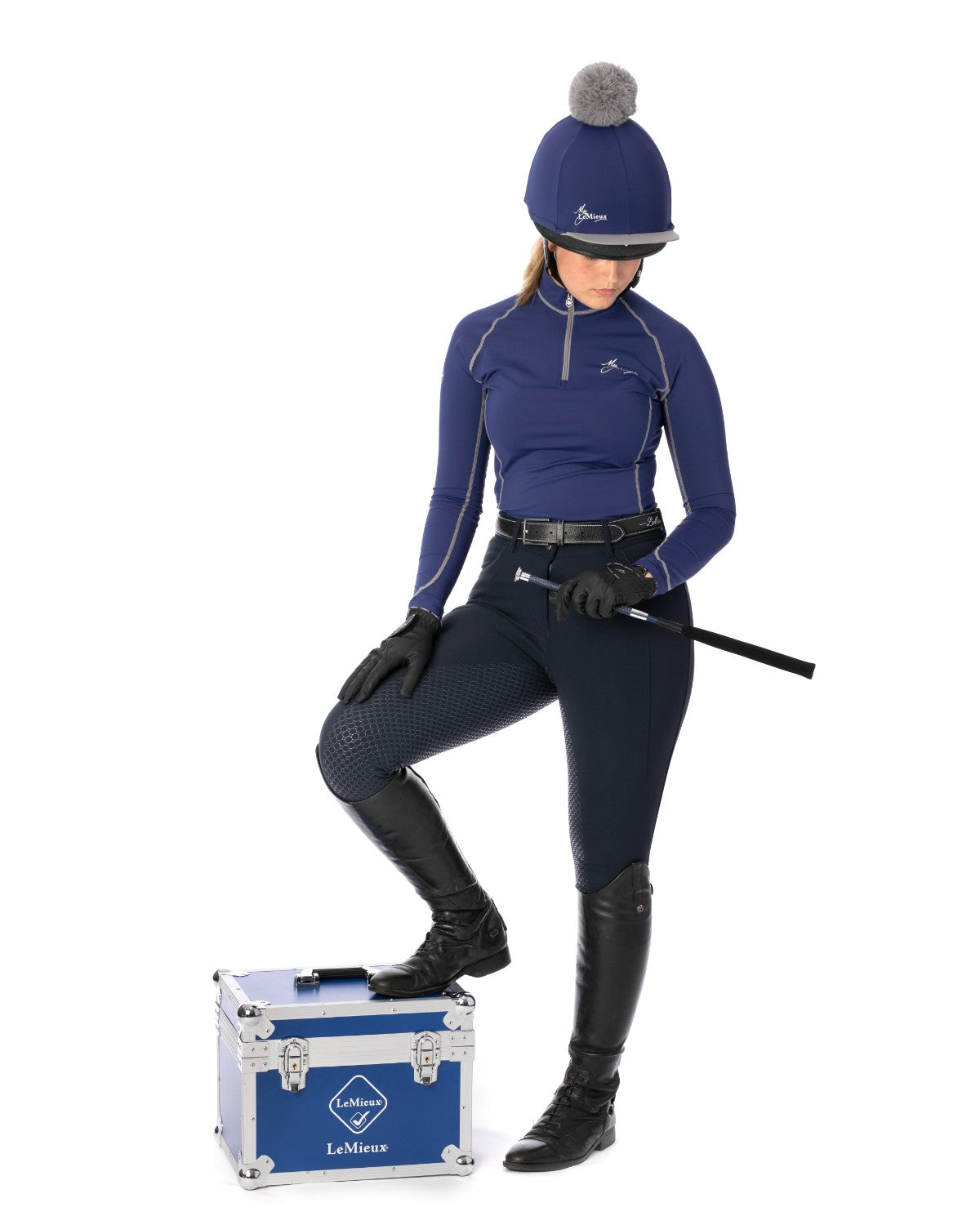 LeMieux Equestrian: Rider in Ink Blue Base Layer, Riding Boots & Helmet. Ready for Riding. 
