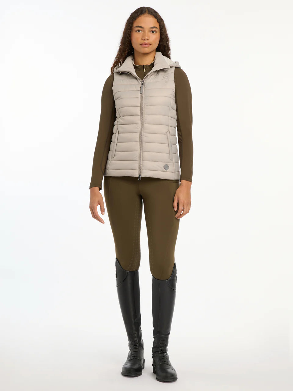 LeMieux Tilly Hooded Puffer Gilet Ash: Lightweight, water-resistant vest from Equiflair. Equestrian outerwear.