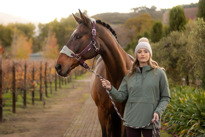Woman with horse wearing Lemieux Phoebe Waterproof Anorak Rosemary from Equiflair - equestrian fashion.