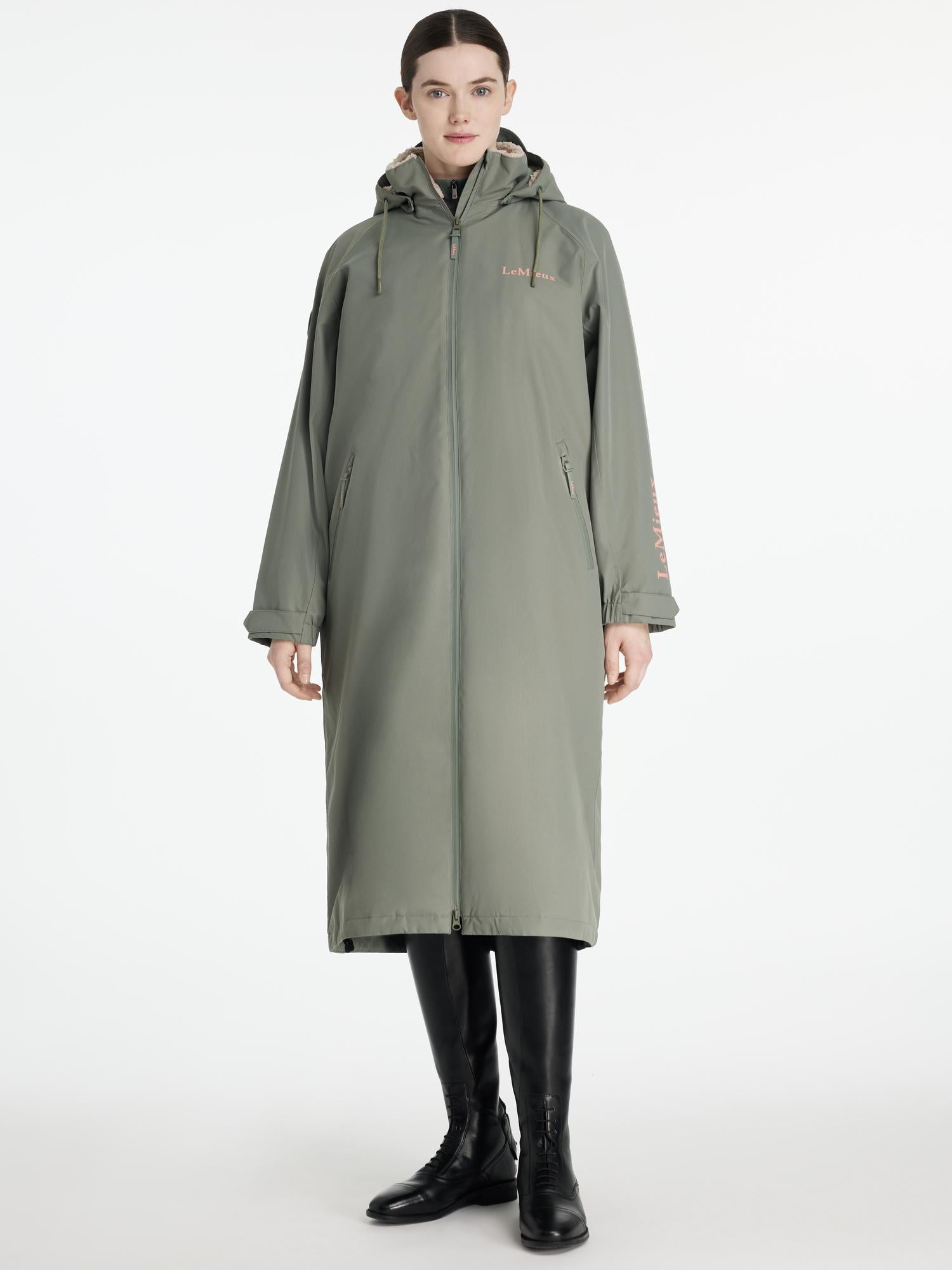 LeMieux HydroShield Rosemary Robe: Full-length waterproof coat for equestrian activities, providing warmth and weather protection.