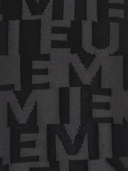 Lemieux Footsie Socks Logo Navy: Close-up of stylish equestrian socks with a modern geometric pattern in dark blue/gray knit.
