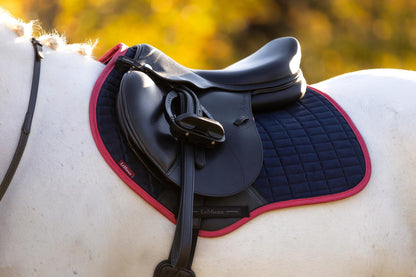 LEMIEUX Suede Close Contact Square - Navy/Cranberry saddle pad on a horse. Equiflair.