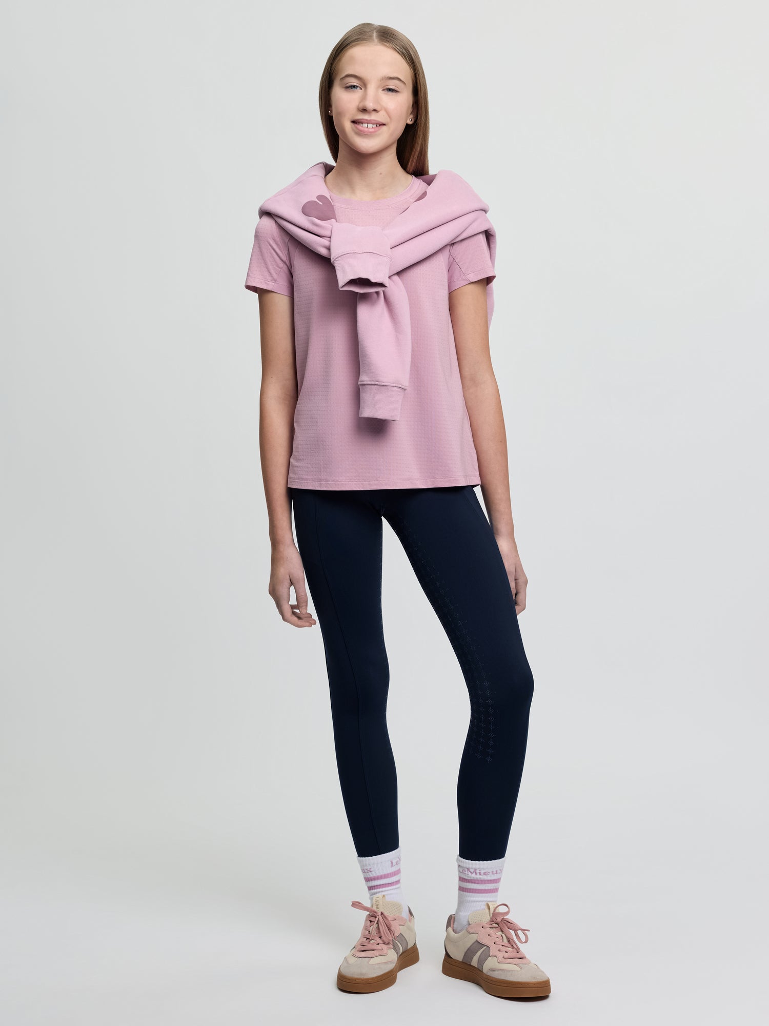 LeMieux Young Rider Sia Hoodie in Fondant: Girl in Pink Outfit with Matching Hoodie