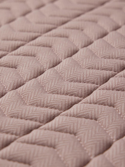 LeMieux Heritage Herringbone Dressage Square saddle pad in Wild Rose, featuring chevron quilting and herringbone fabric.