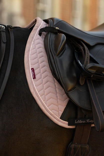 LeMieux Heritage Herringbone Jump Square saddle pad in Wild Rose pink on a horse.