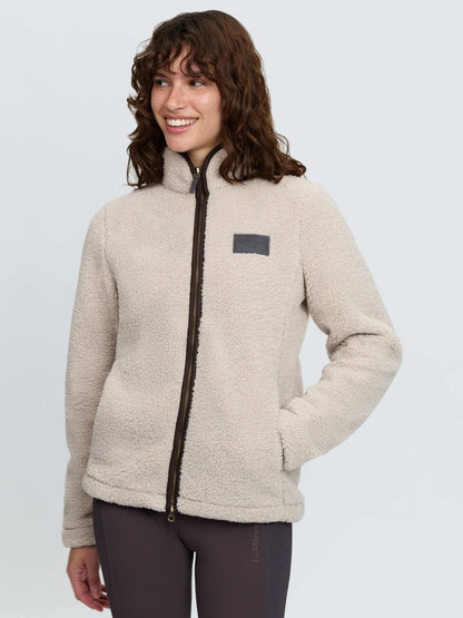 LeMieux women's stone color borg fleece jacket with full zip and faux leather badge.