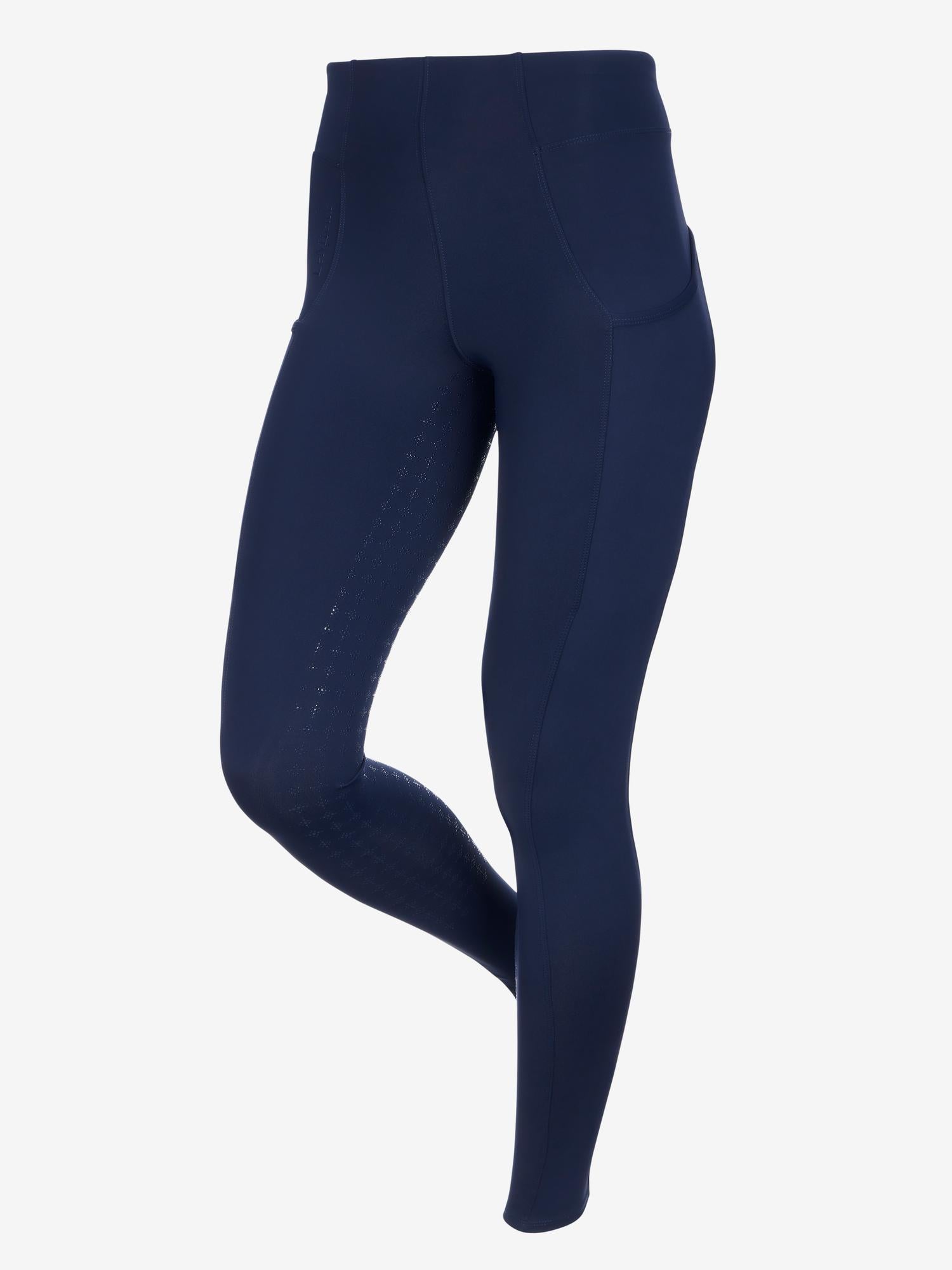 LeMieux navy tall riding breeches with full silicone seat and phone pockets.