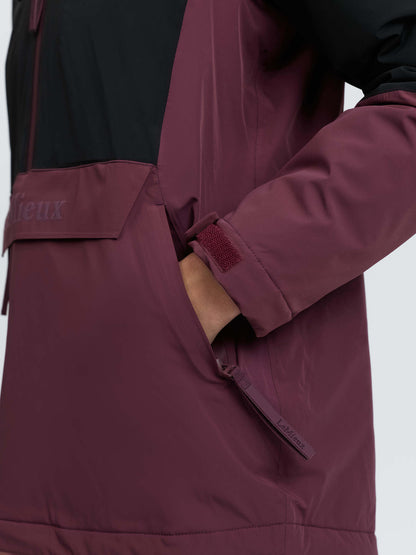 LeMieux Phoebe Half Zip Waterproof Anorak in Black/Bramble: Kangaroo pocket detail, taped seams, LeMieux logo tag.
