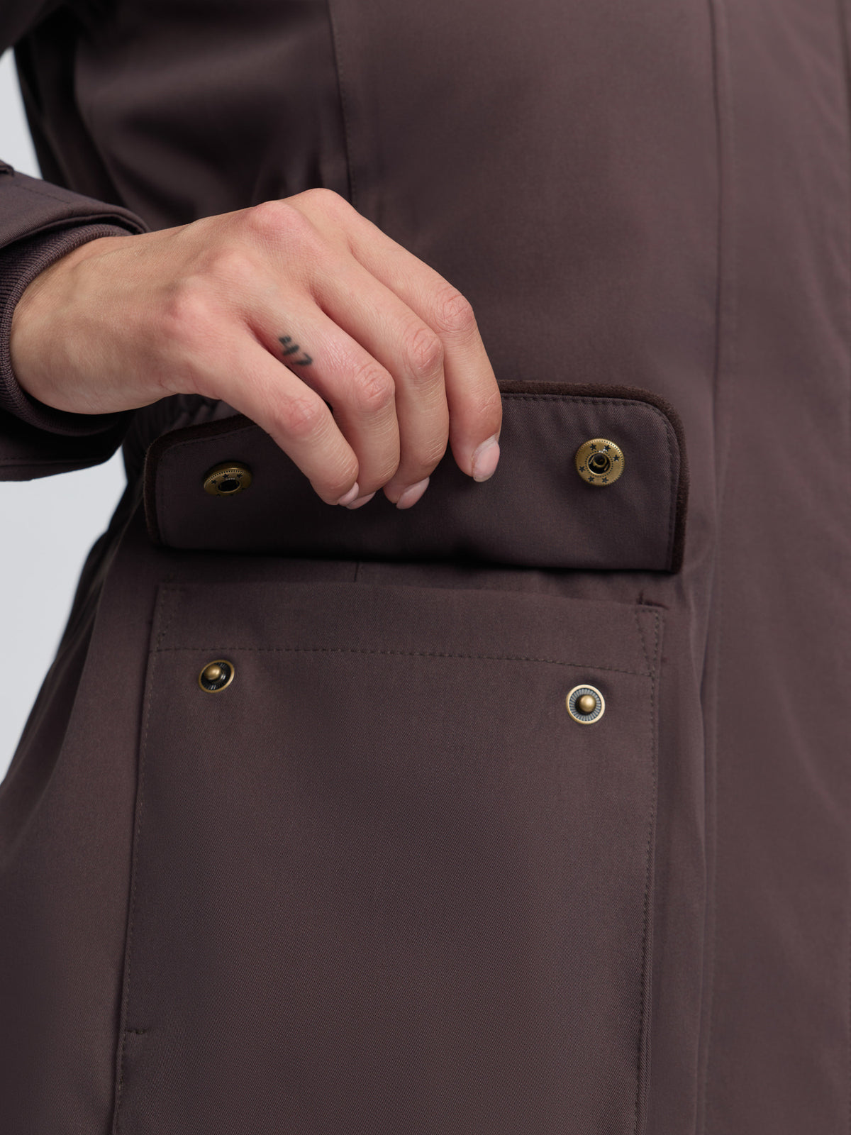 LeMieux Heritage Beatrice waterproof coat cocoa brown detail of large patch pockets with snap closure