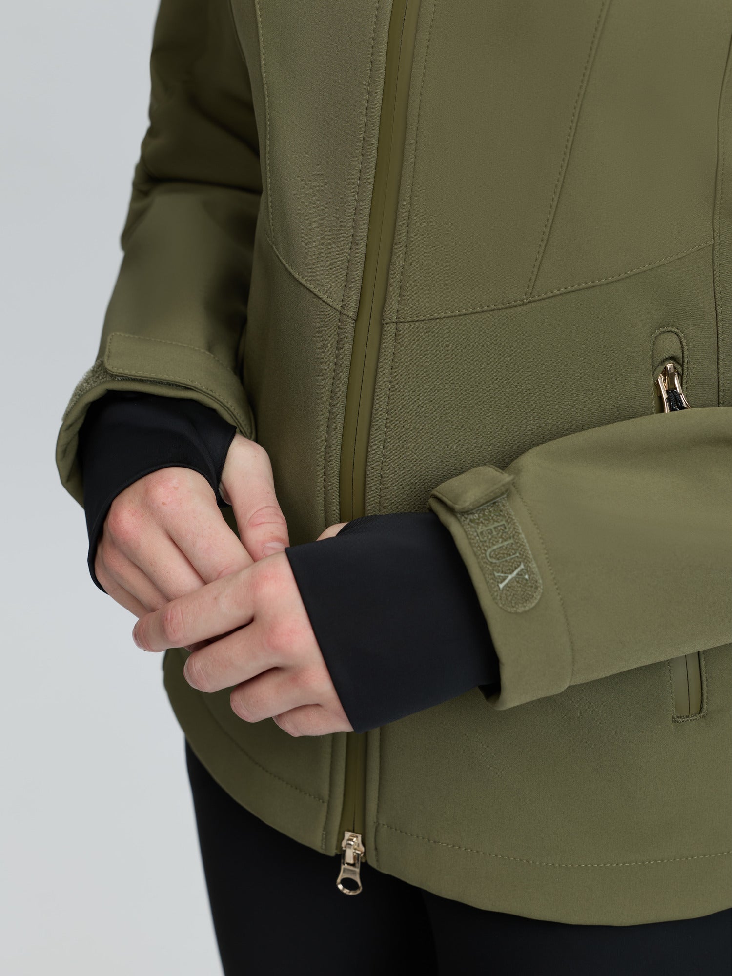 LEMIIEUX CELINE SOFTSHELL JACKET WILLOW GREEN by Equiflair - Close up on cuff and zipper.