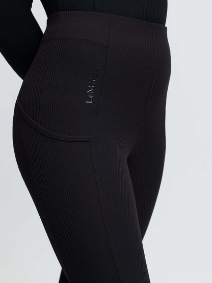 LeMieux Young Rider black ribbed pull-on riding leggings with phone pocket and full seat grip.