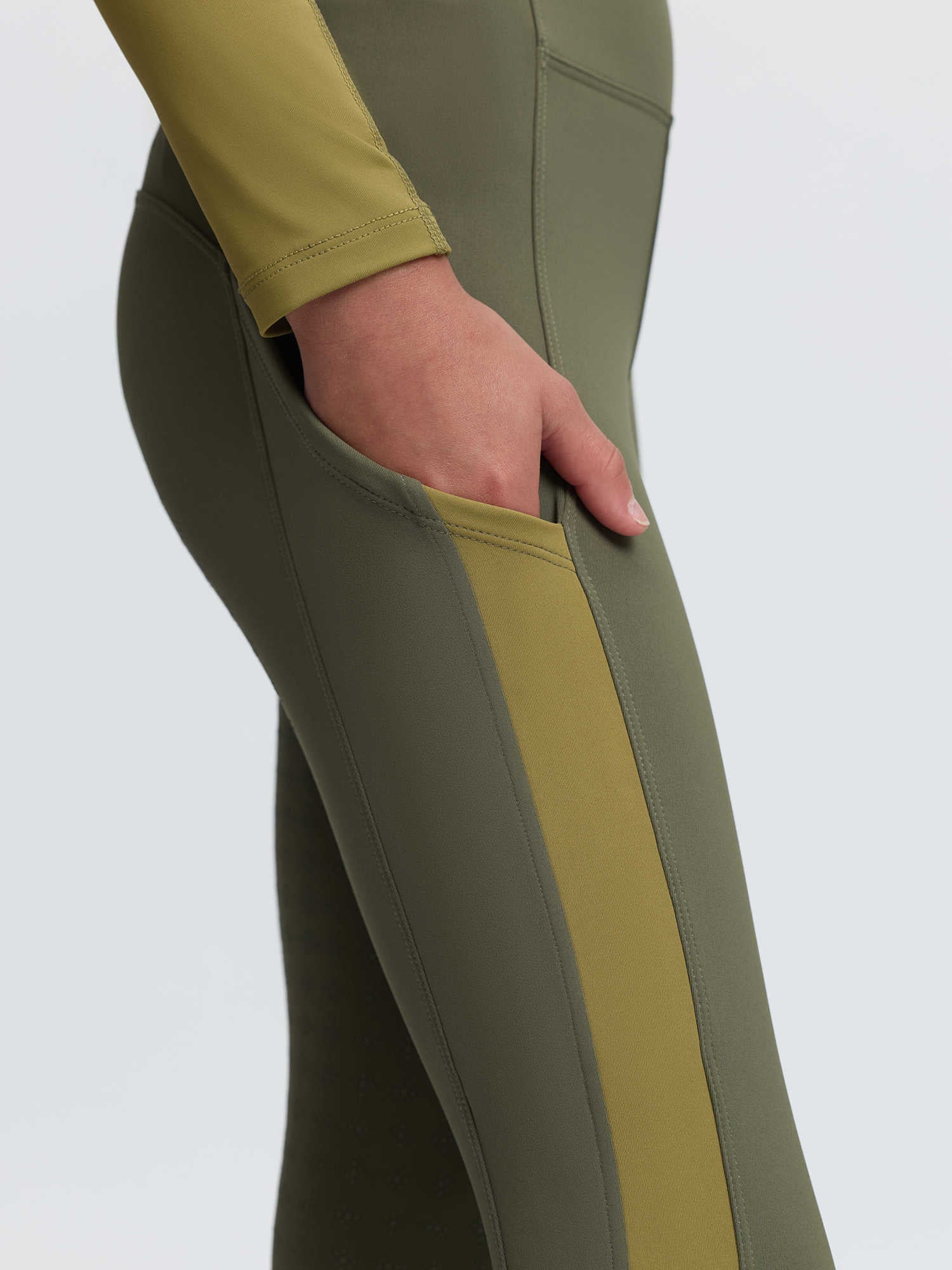 LeMieux Willow Green riding leggings for young riders with convenient leg pocket