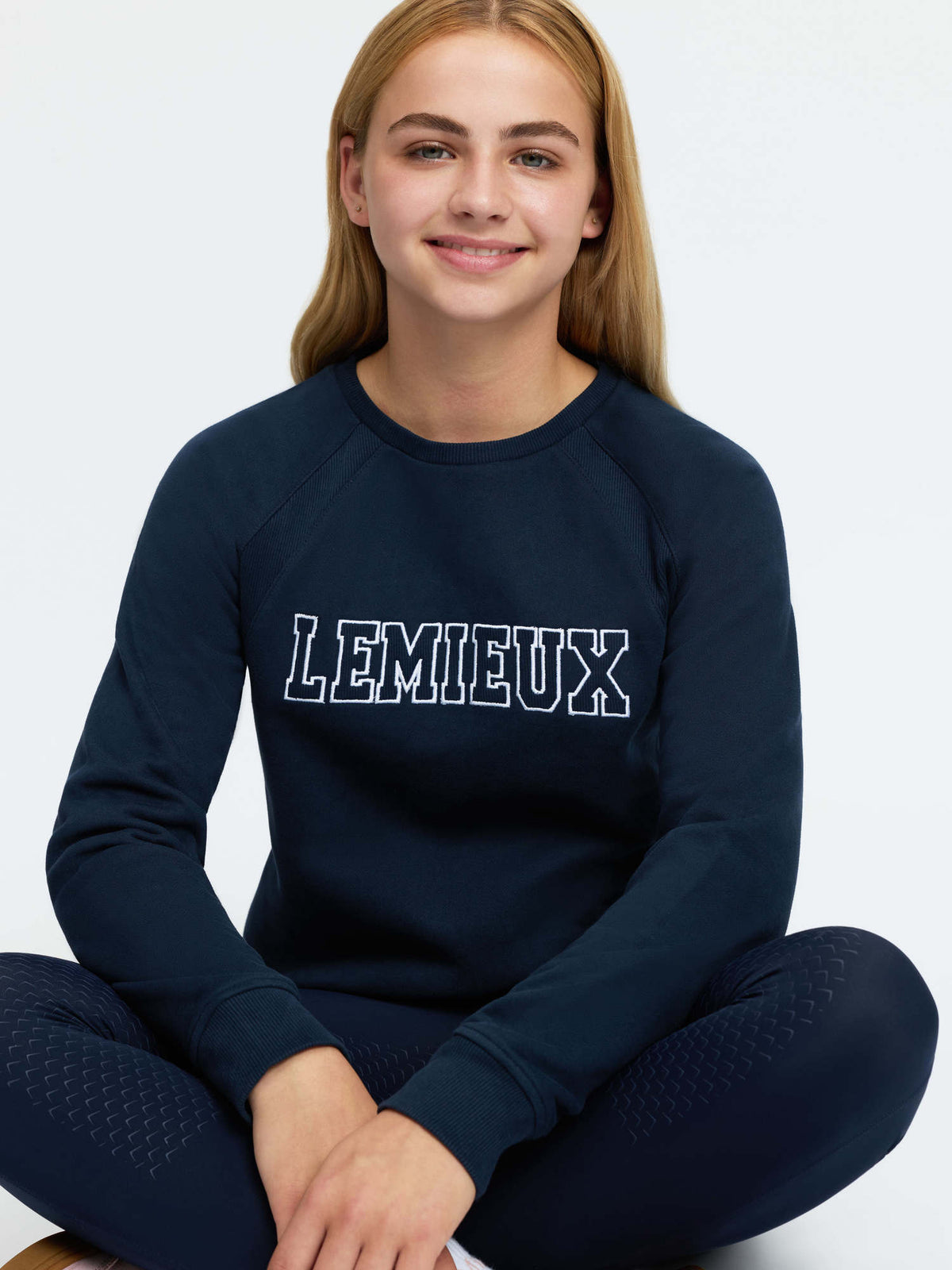 LEMIENX Young Rider Shay Varsity Crew Navy Sweatshirt for equestrian style and comfort.