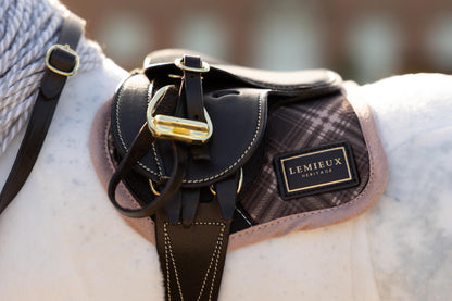 LeMieux toy pony saddle pad with Heritage check pattern and gold logo badge. Close-up.