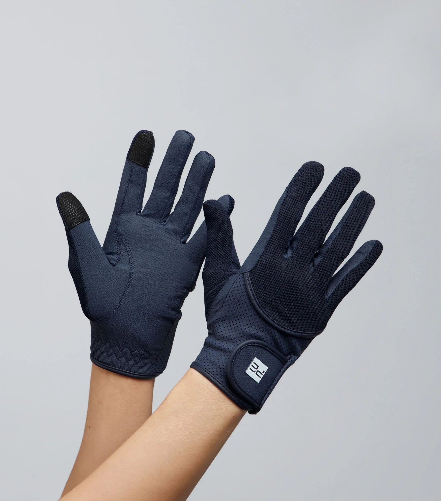 Premier Equine Presa Junior Navy Mesh Riding Gloves for equestrian activities and competition use.