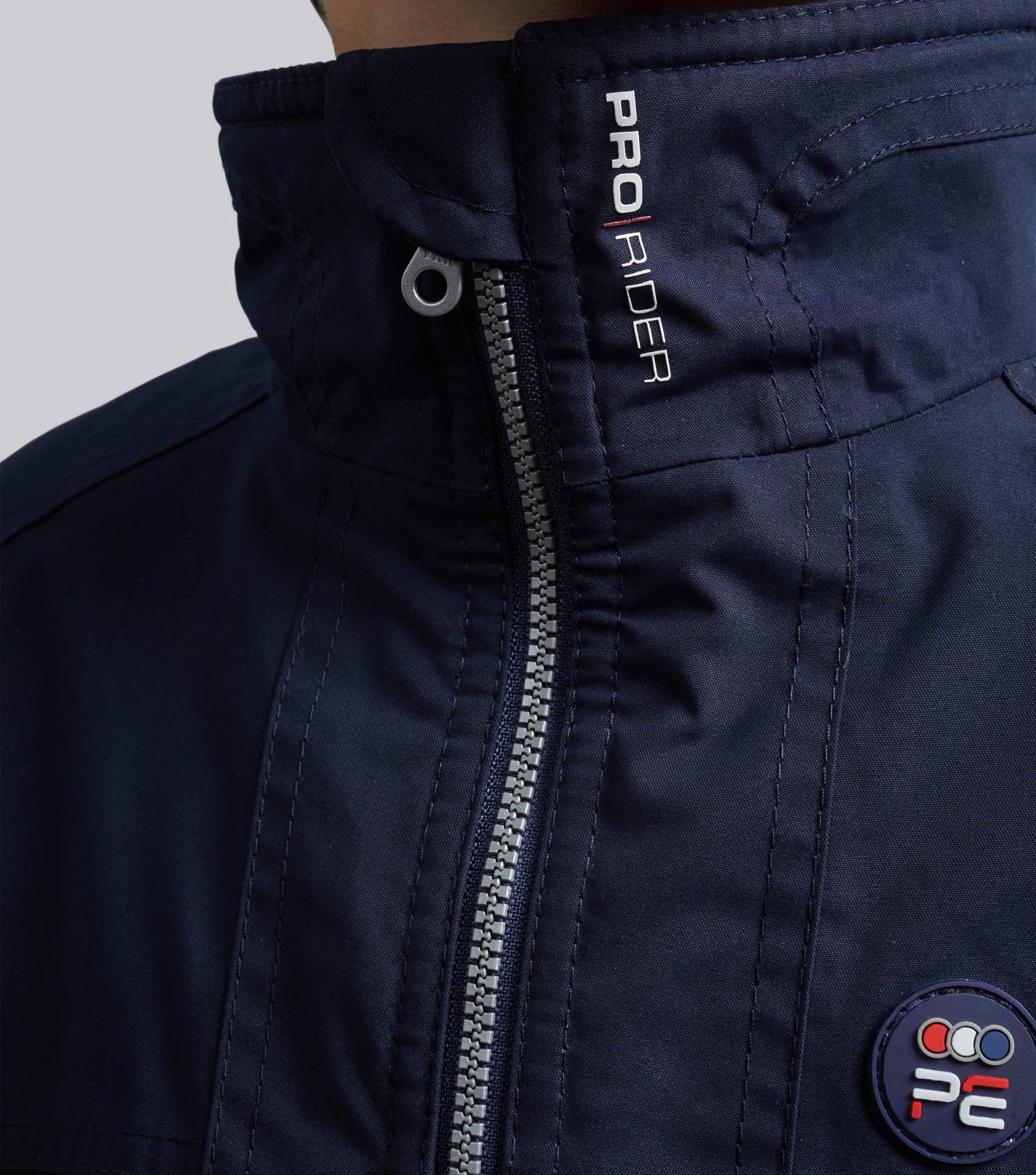 Premier Equine Junior Pro Rider Navy Riding Jacket - Waterproof, Unisex design.