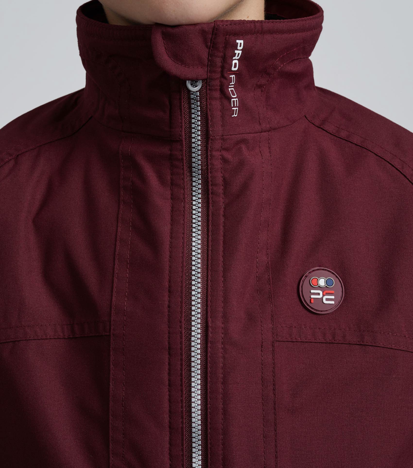 PREMIER EQUINE JUNIOR PRO RIDER Unisex Riding Jacket Wine: Waterproof riding coat for kids & teens.