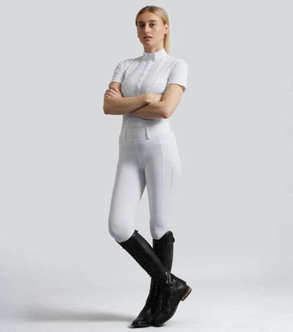 Premier Equine Luceo White Gel Knee Competition Riding Tights. Woman in equestrian apparel. Comfortable and Stylish.