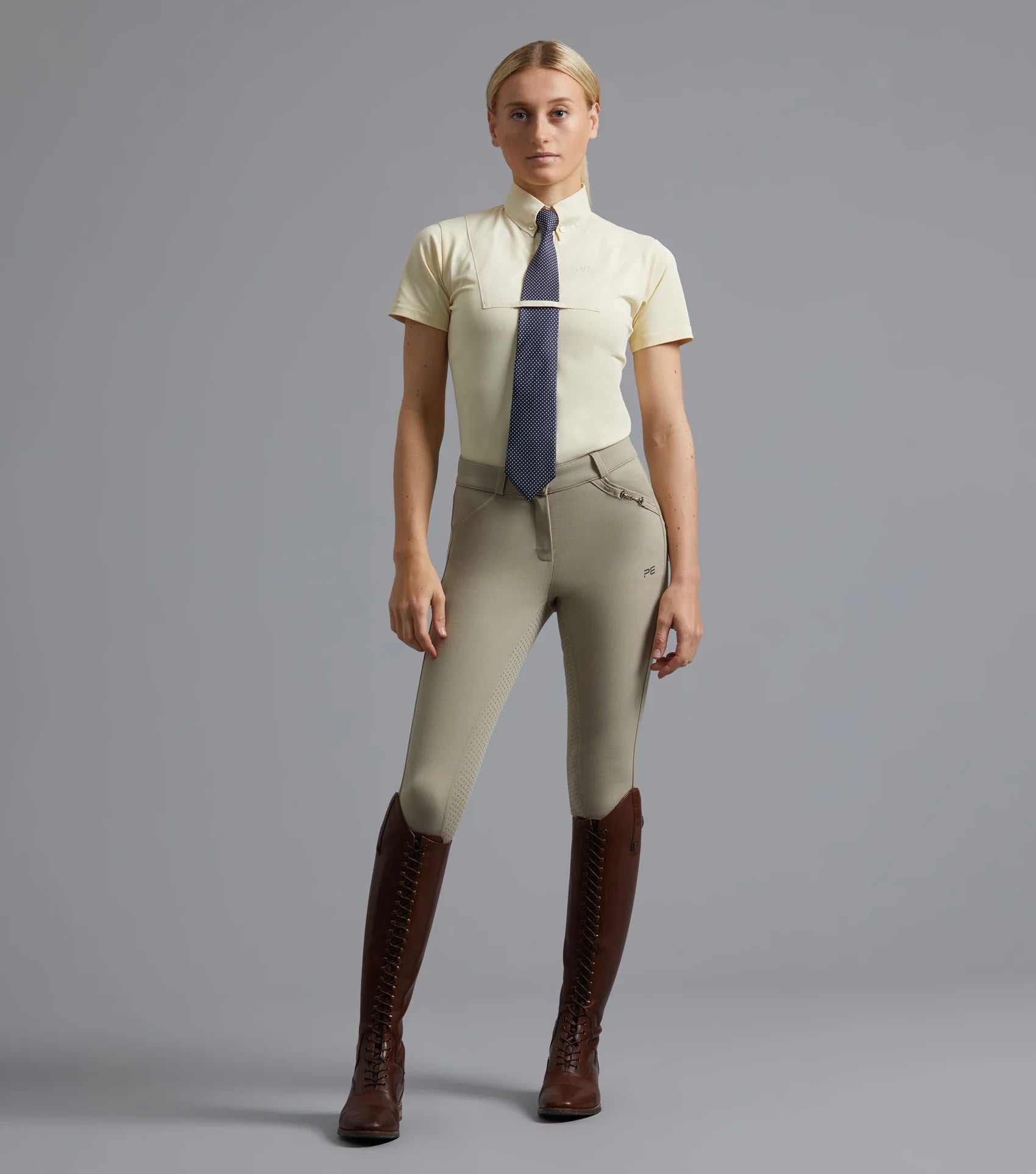 PREMIER EQUINE Luciana Ladies Short Sleeve Tie Shirt Vanilla: Equestrian performance, moisture-wicking, competition ready. Equiflair
