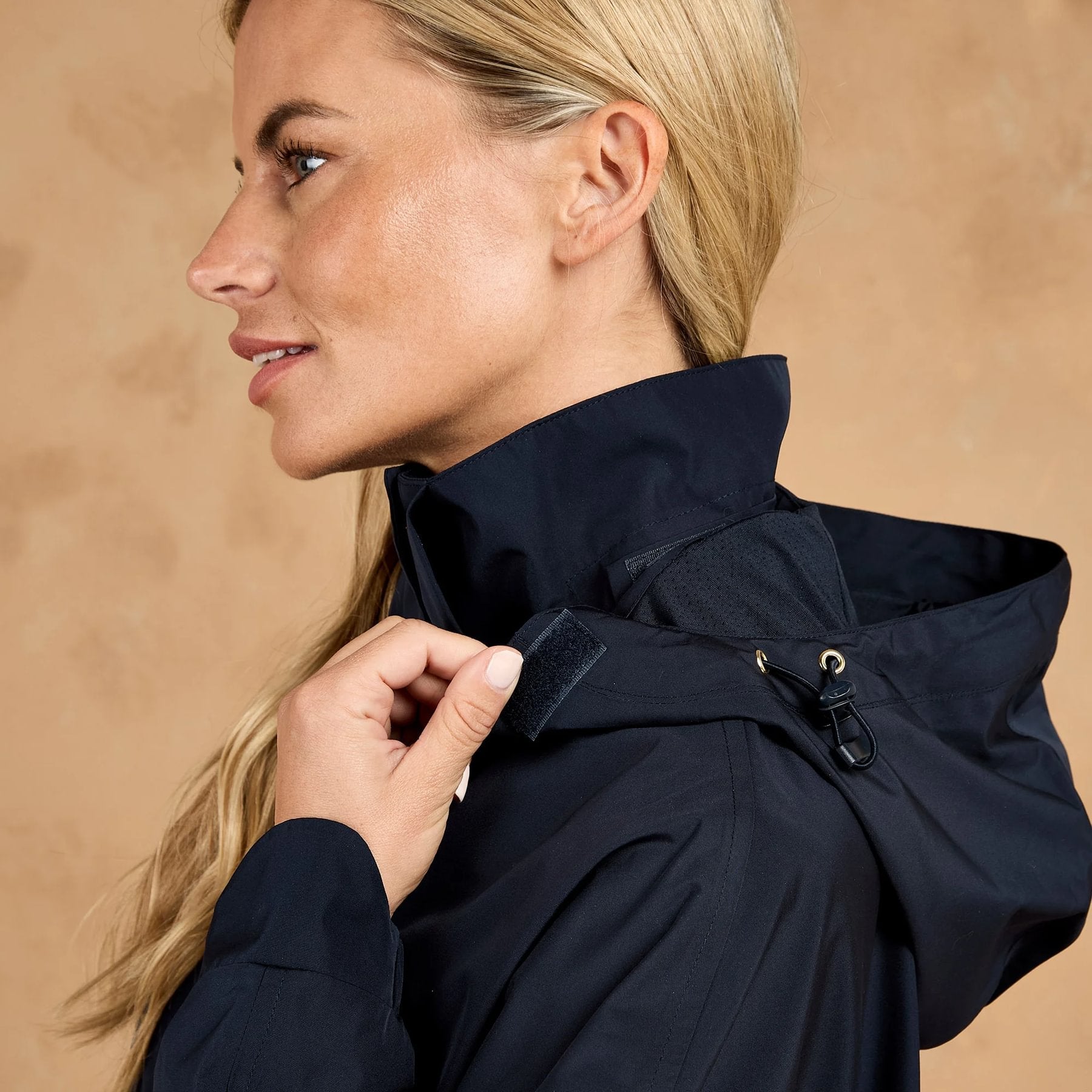 TOGGI Meyer womens waterproof blouson jacket in navy, close-up of hood and collar detail.