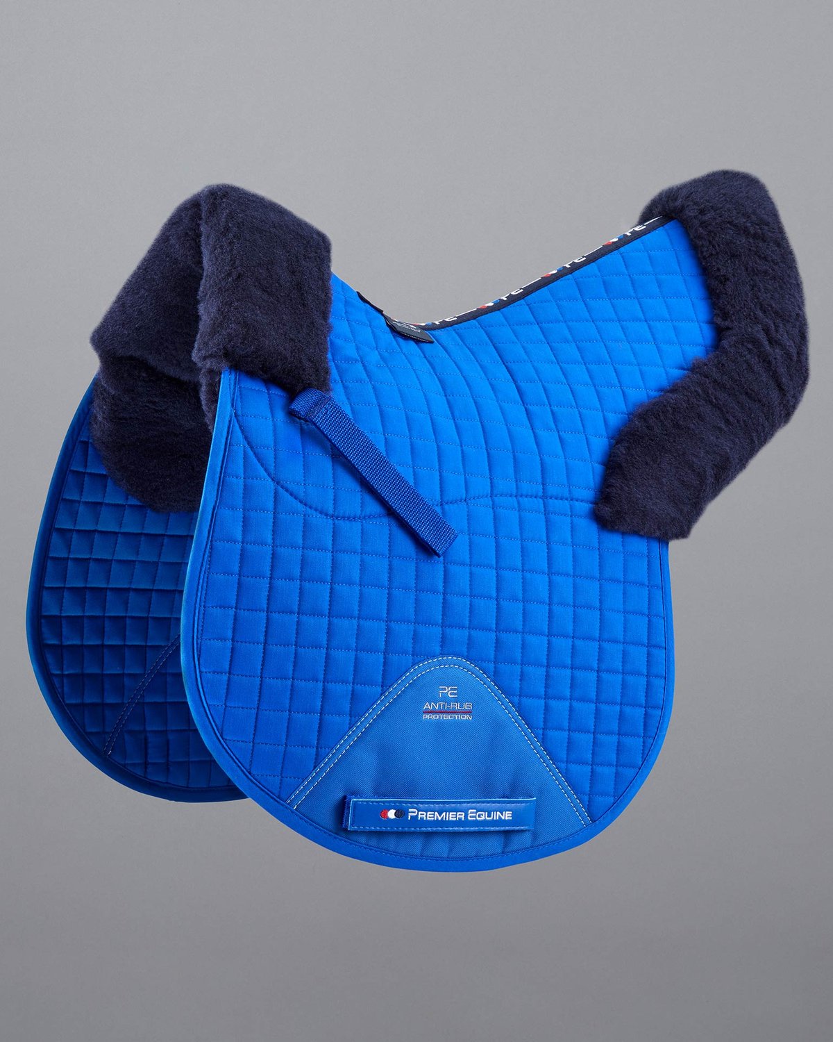Premier Equine merino wool saddle pad, GP/Jump numnah, royal blue with navy wool trim. Equiflair