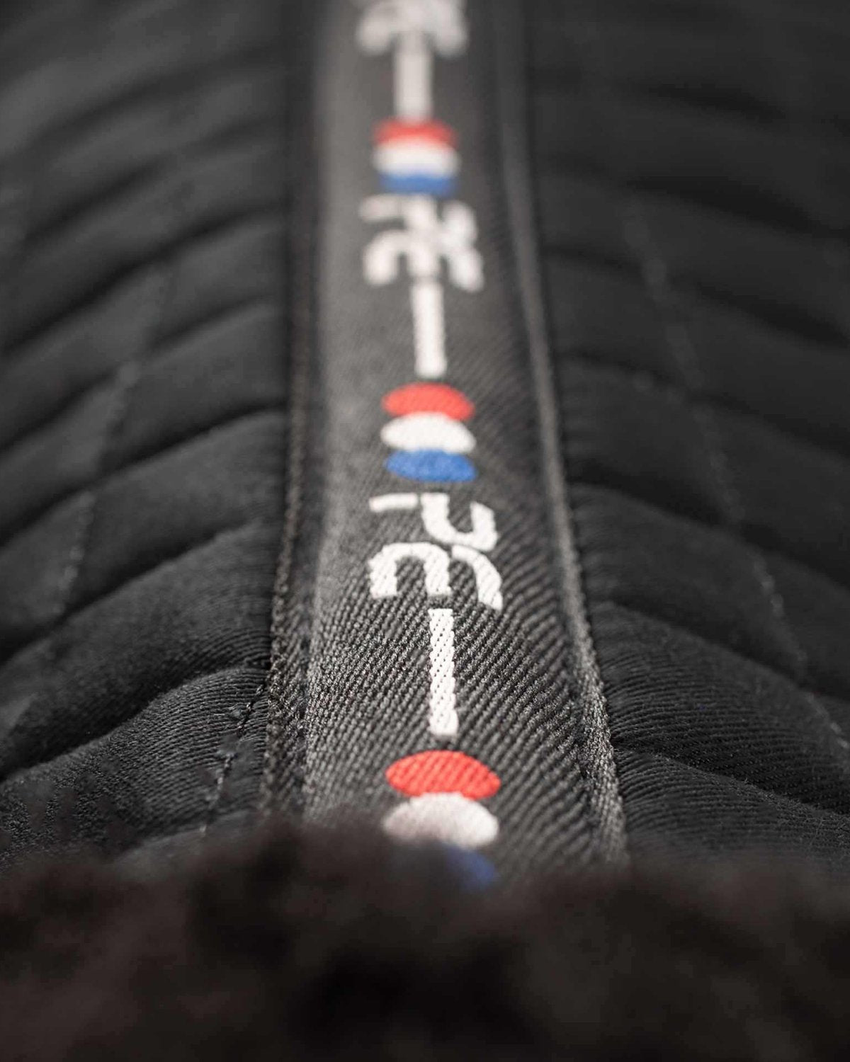 Premier Equine Merino Wool Saddle Pad. Black with stripe detail. Comfortable and breathable horse saddle pad.