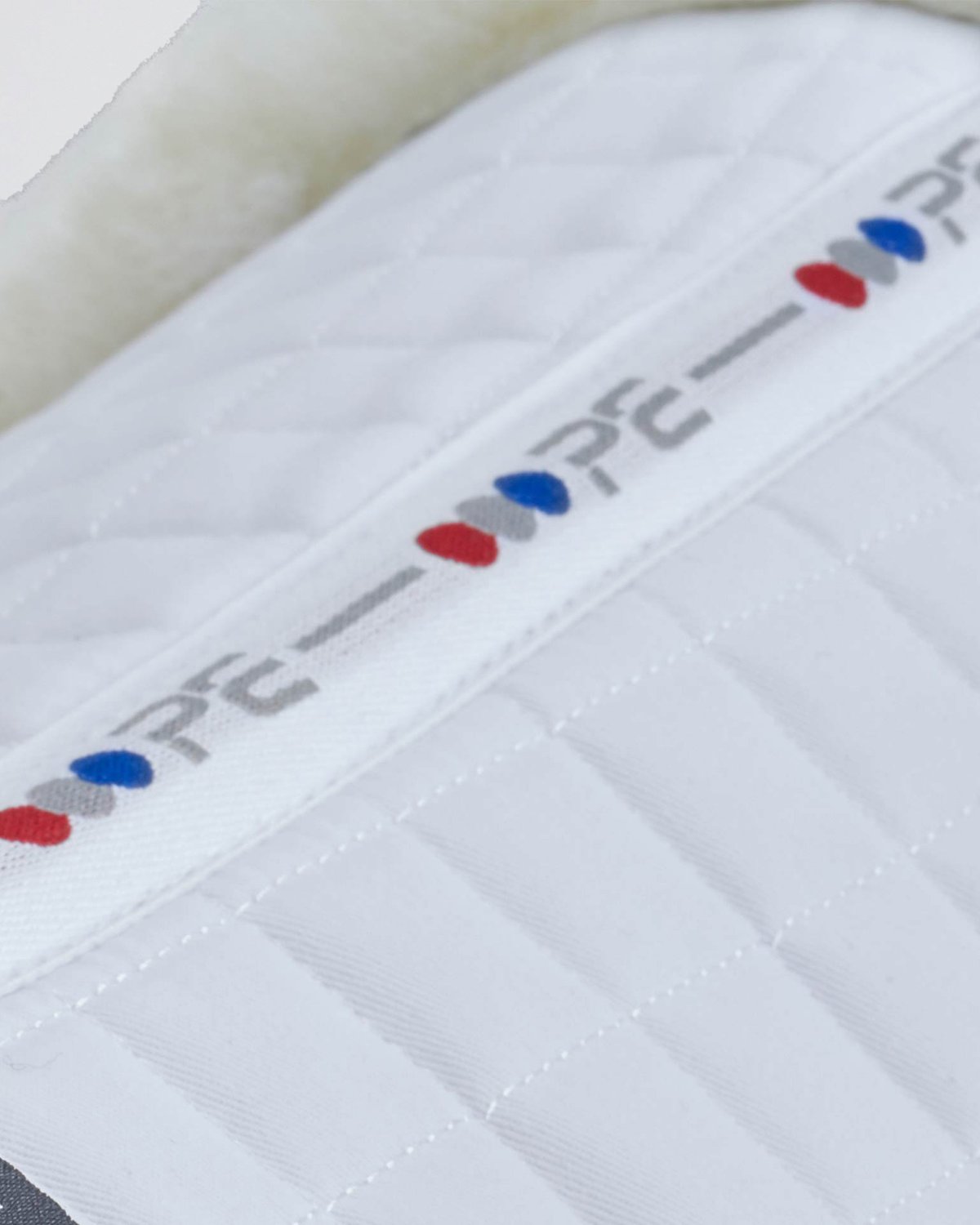 Premier Equine Merino Wool Half Saddle Pad - White. Horse riding saddle pad from Equiflair.