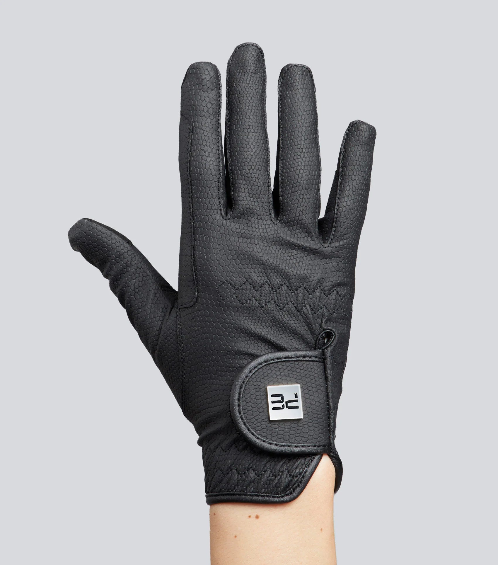 Black Premier Equine Metaro Ladies Riding Glove on Hand - Reptilian Texture, Touchscreen Compatible