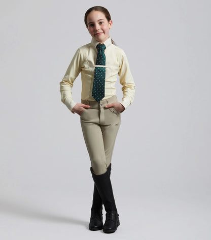 Girl in Premier Equine Tessa Vanilla Riding Shirt - Equestrian Show Attire