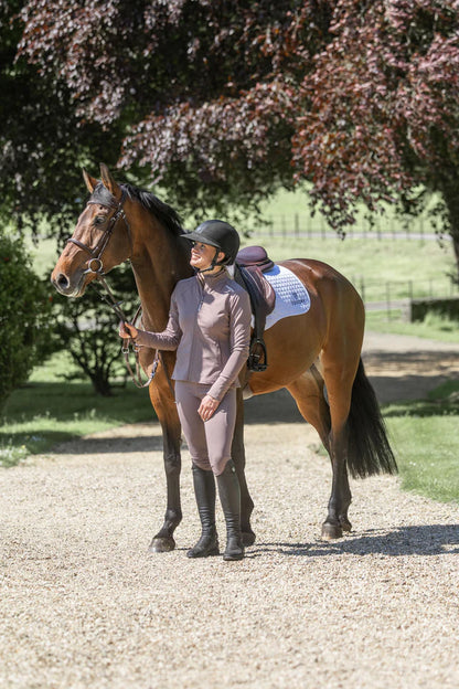 Equestrian Girl with Horse in EquiFlair Water Repellent Riding Leggings - Mocha/White. Youth Horseback Riding Apparel.
