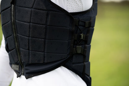 RACESAFE MOTION 3 Body Protector: Black equestrian safety vest with segmented design and adjustable straps.