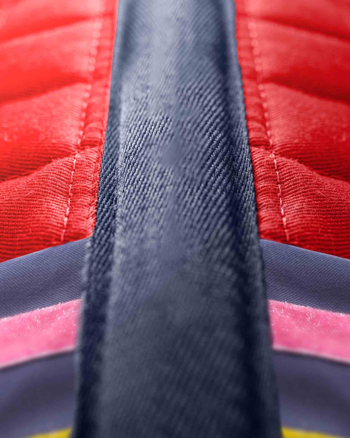 Close-up: Premier Equine My Pony Jack Red Glitter GP/Jump Saddle Pad. Equestrian equipment for ponies.