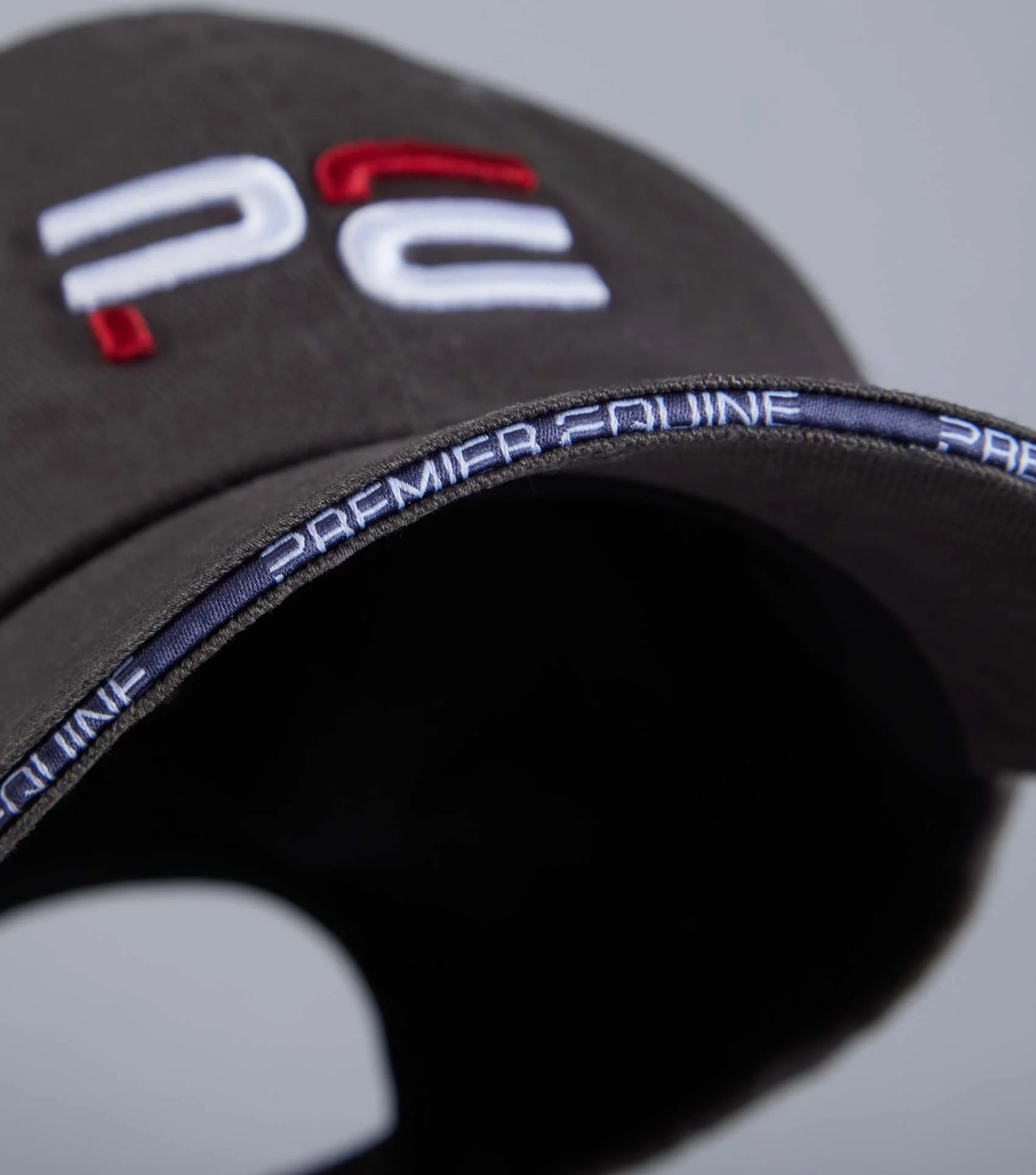 Premier Equine Baseball Cap - Anthracite Grey. Stylish embroidered PE cap from Equiflair with adjustable clasp.