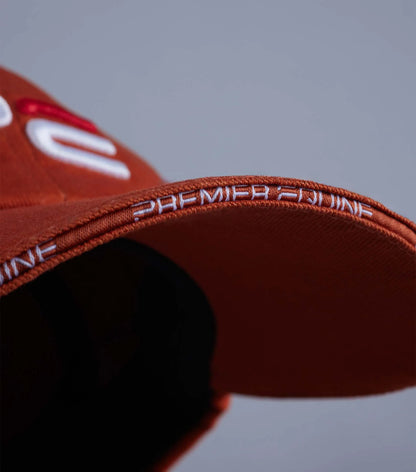Premier Equine Burnt Orange Baseball Cap: Embroidered Logo, Adjustable Strap. Stylish Equestrian Headwear.