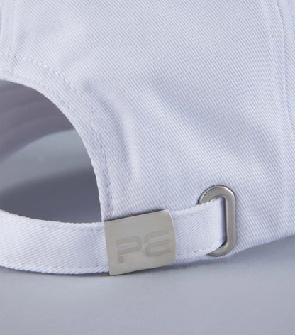 Premier Equine White Baseball Cap: Adjustable, Embroidered Design. Stylish Sportswear Accessory. Close up shot of clasp and band.