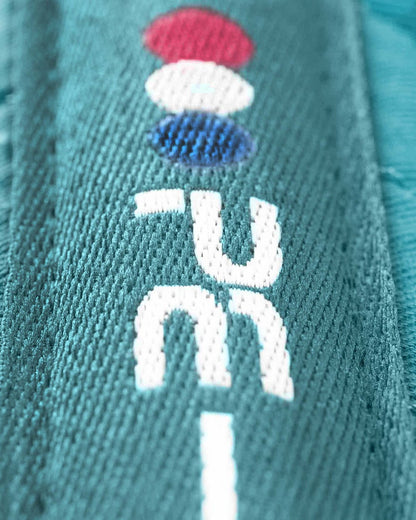 Premier Equine Pony Plain Cotton GP/Jump Square Saddle Pad - Turquoise Close-up.