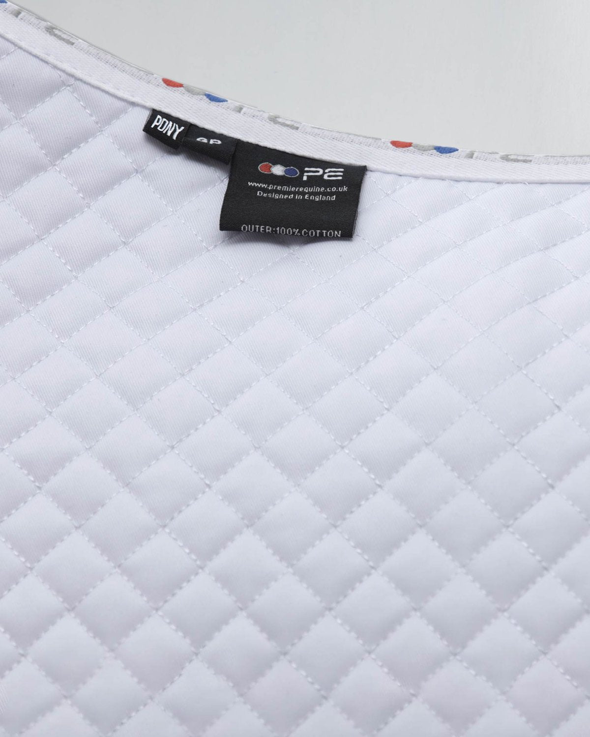 Premier Equine Pony White Dressage Saddle Pad, Cotton. For comfort, protection, and breathability during training.