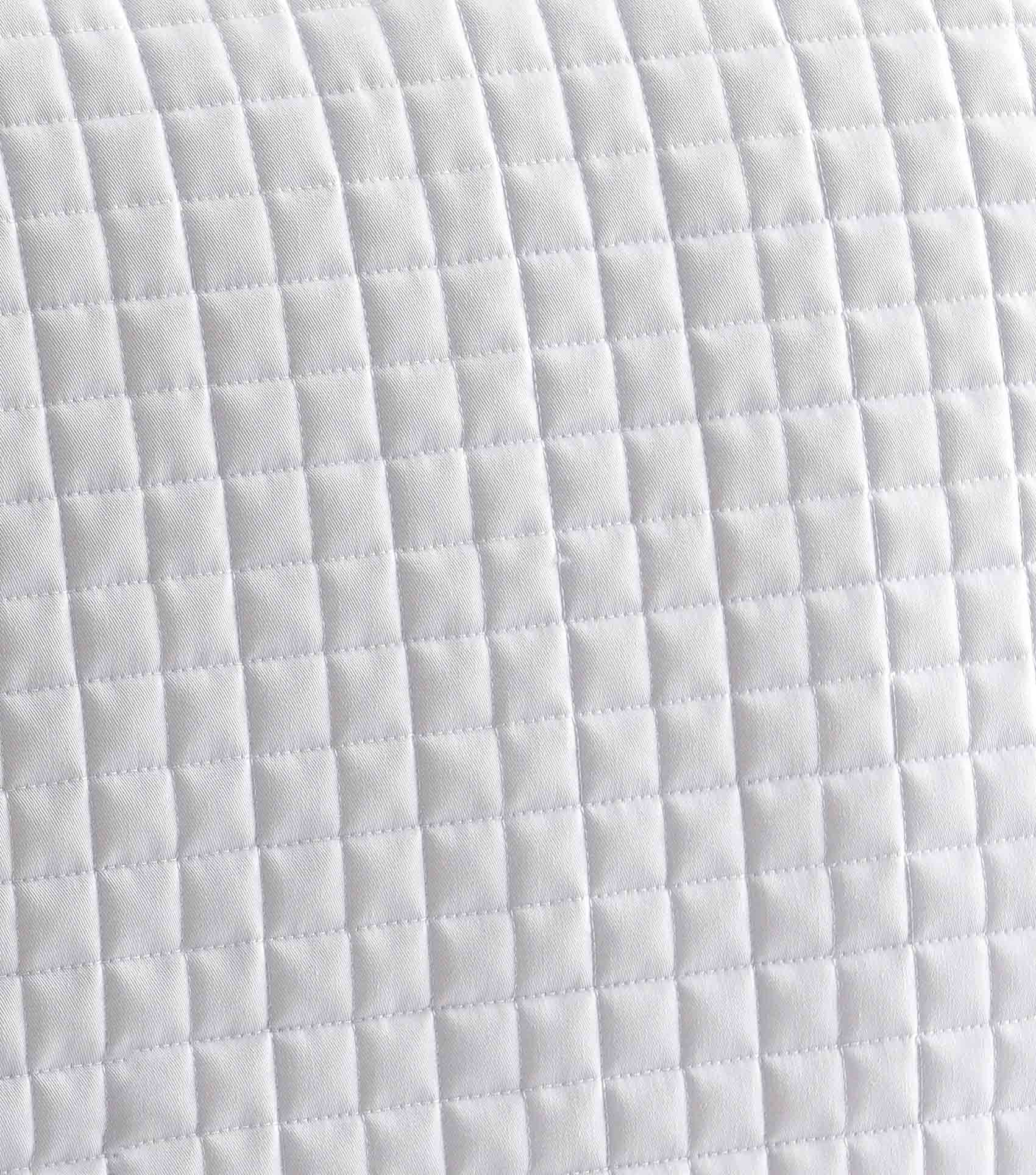 White Quilted Pony Saddle Pad: Close Contact, Durable Design. Ideal for sensitive ponies.