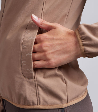 Premier Equine Valerius women's latte jacket with discreet pocket, recycled performance fabric.