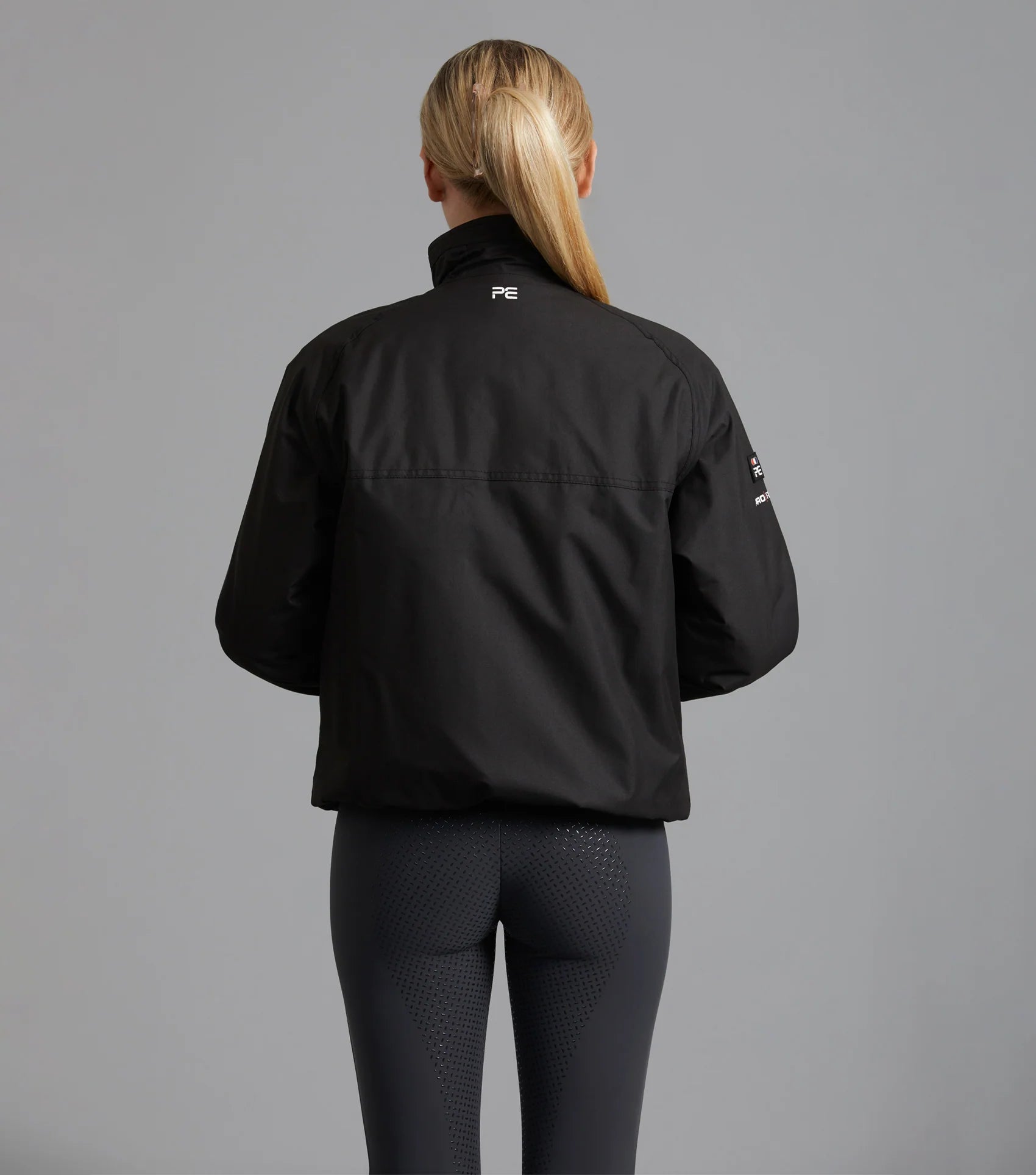 Premier Equine Pro Rider Waterproof Riding Jacket - Unisex Black equestrian outerwear. Equestrian Fashion