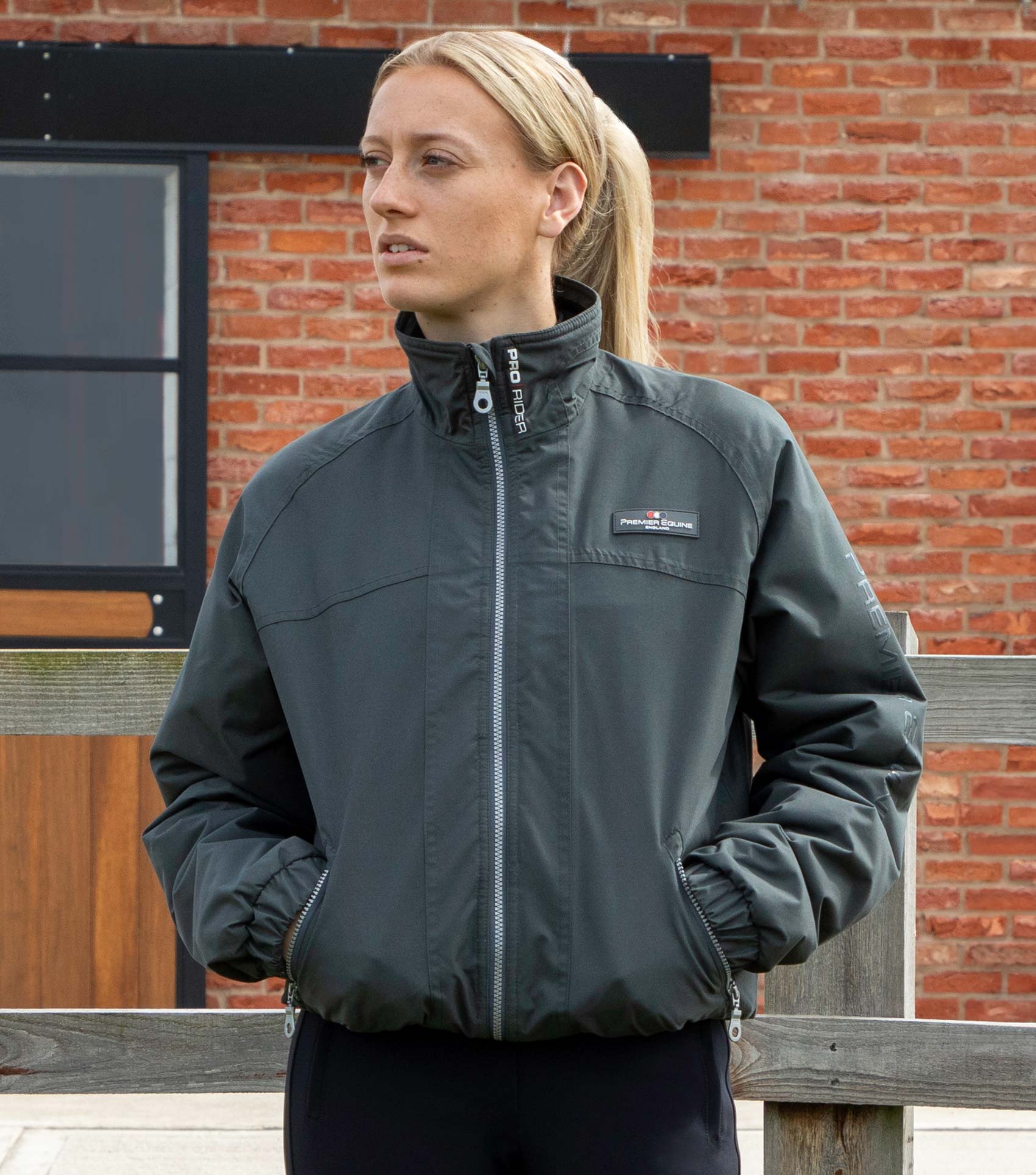 PREMIER EQUINE PRO RIDER Waterproof Riding Jacket Anthracite Grey. Unisex equestrian coat with pockets, zipper and quilted lining.