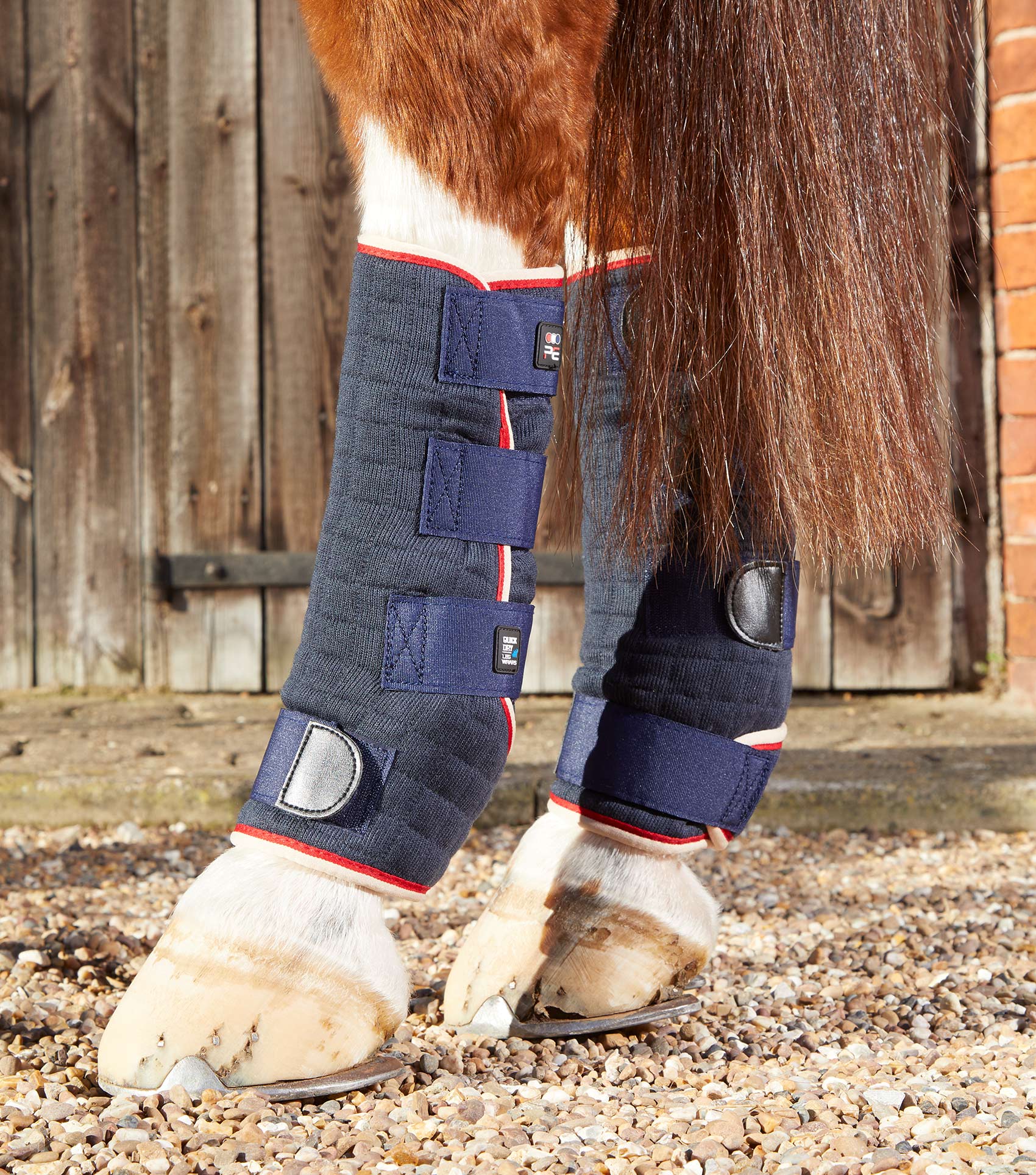 Premier Equine Quick Dry Horse Leg Wraps in Navy. Protective boots for equine leg support & cooling. Equiflair Stockist.