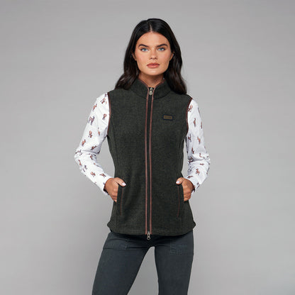TOGGI REGENT Women's dark green fleece gilet worn with a deer print shirt.
