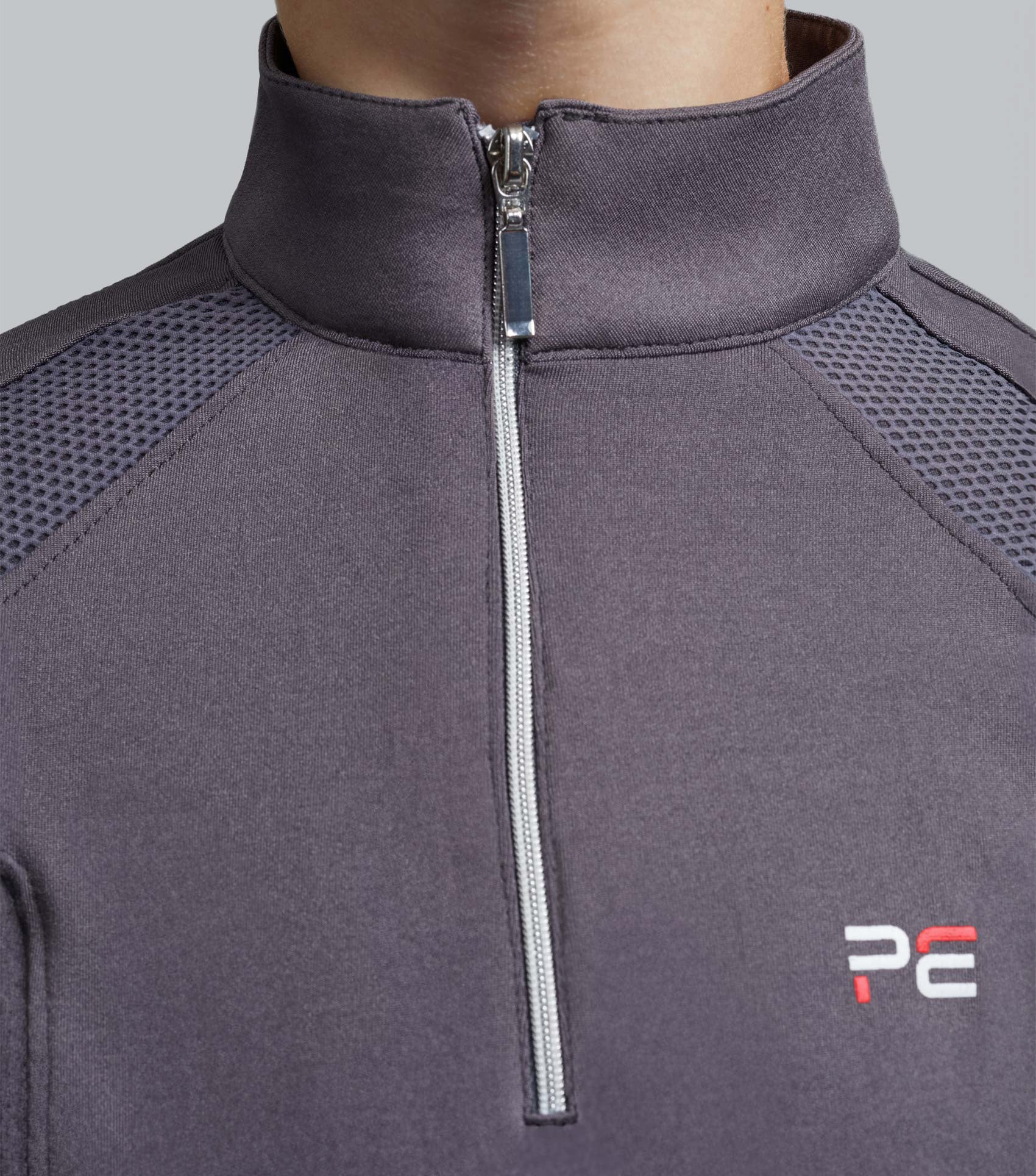 Premier Equine girl's grey technical riding top with mesh ventilation panels and quarter zip. Kids equestrian apparel.