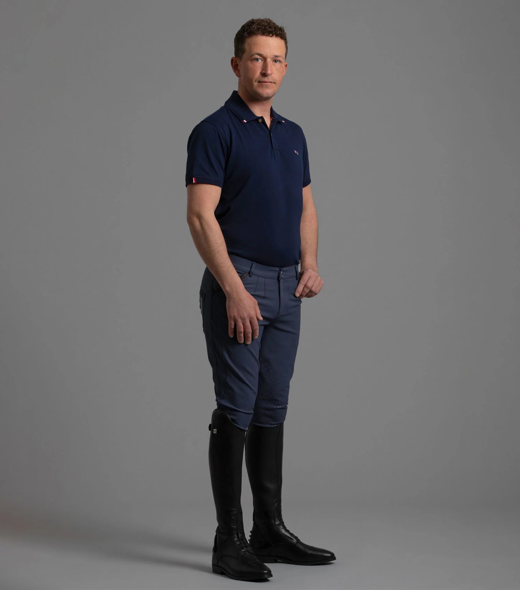 PREMIER EQUINE Respiro Men's Riding Polo Shirt Navy: Stylish equestrian polo top in navy, perfect for riding and casual wear.